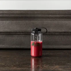 Gourde Transparente - Verte "Rive Gauche" - Non Merci